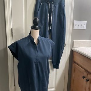 FIGS scrubs Dark Harbor, top XS, bottoms XS/P. Worn by pharmaceutical sales rep